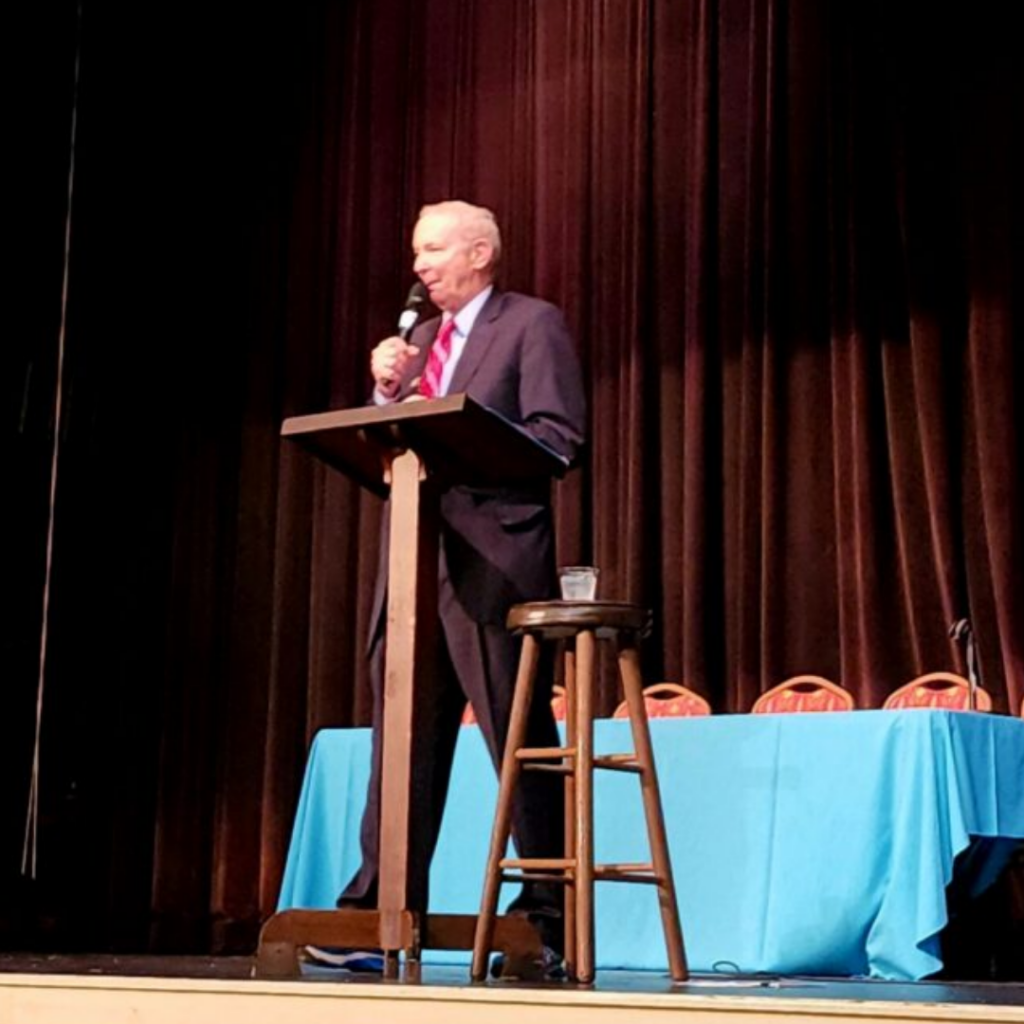 Image of Sam Beard, Founder, speaking at advocacy event.