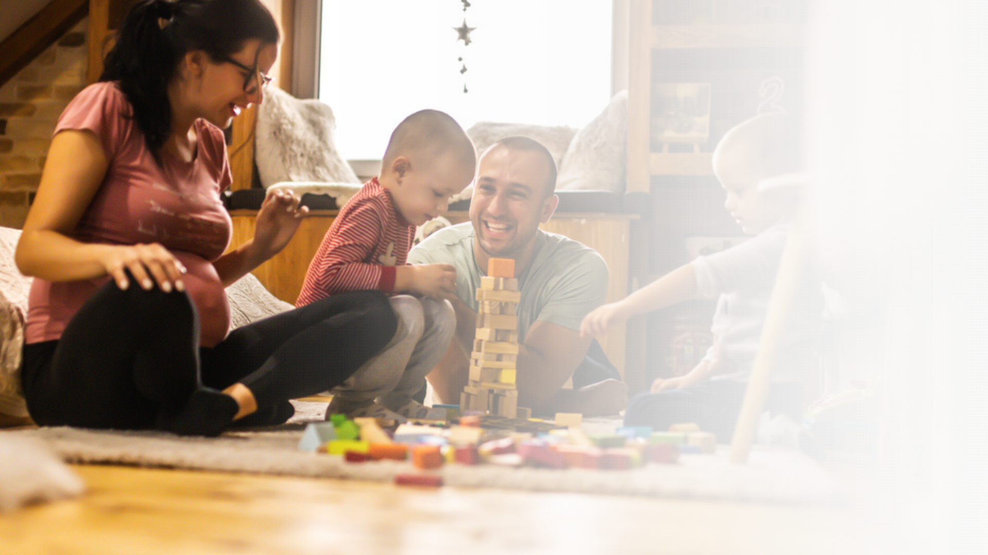 Parenting Tips - Image of mother and father with young child